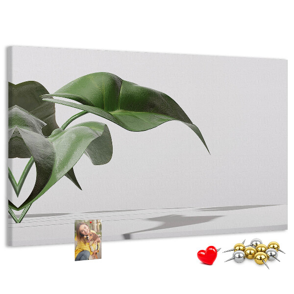 Tablero de corcho decorativo hojas delicadas sobre fondo minimalista