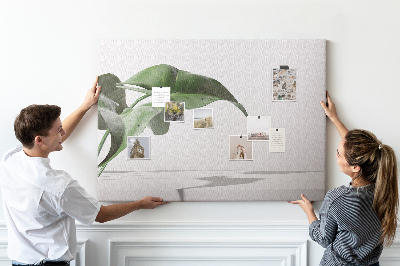 Tablero de corcho decorativo hojas delicadas sobre fondo minimalista