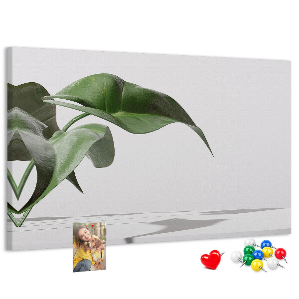 Tablero de corcho decorativo hojas delicadas sobre fondo minimalista