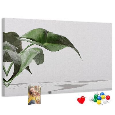Tablero de corcho decorativo hojas delicadas sobre fondo minimalista