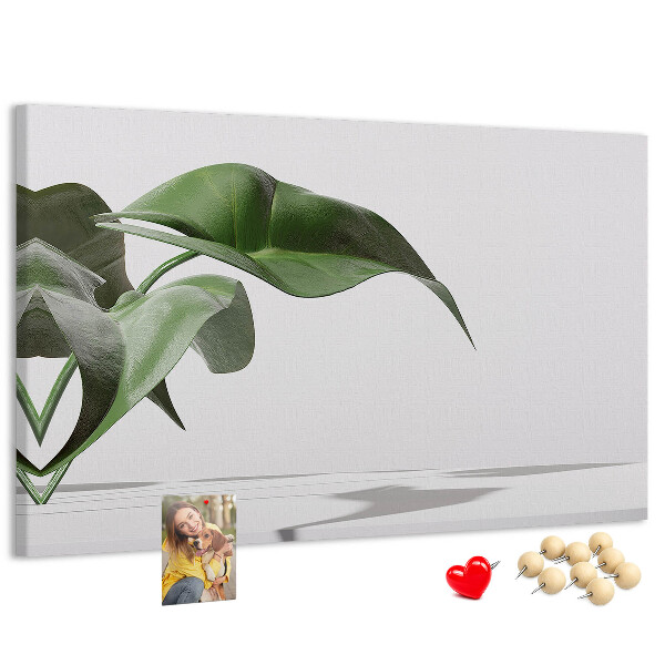 Tablero de corcho decorativo hojas delicadas sobre fondo minimalista