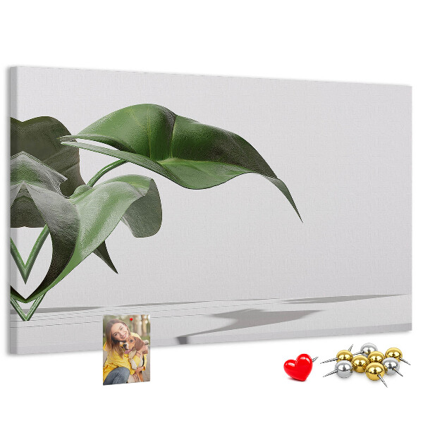 Tablero de corcho decorativo hojas delicadas sobre fondo minimalista