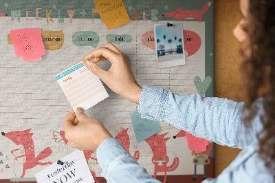 Tablero de corcho decorado con diseño de animales retro y agenda semanal