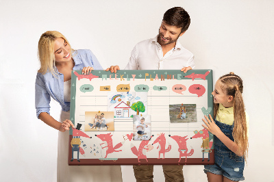 Tablero de corcho decorado con diseño de animales retro y agenda semanal