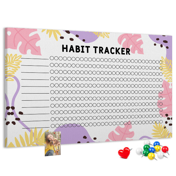 Tablero de corcho decorado con diseño tropical de hojas y puntos