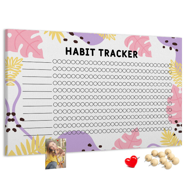 Tablero de corcho decorado con diseño tropical de hojas y puntos