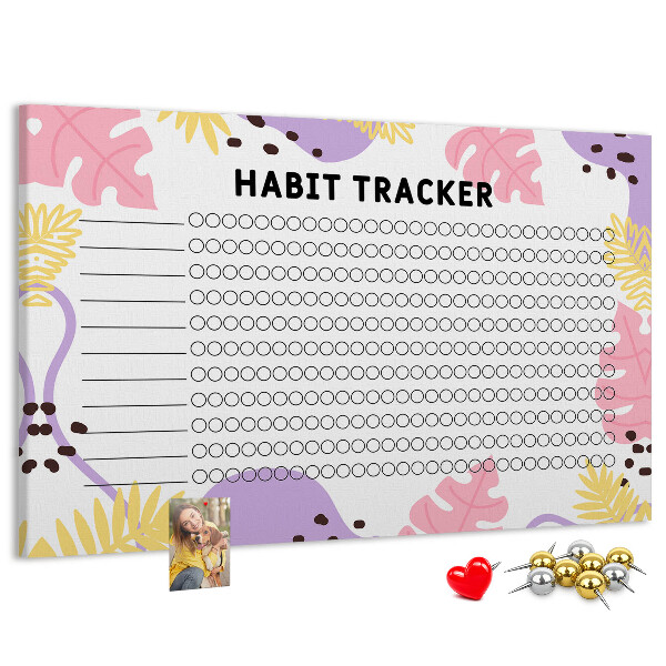 Tablero de corcho decorado con diseño tropical de hojas y puntos