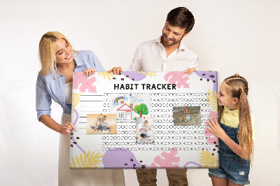 Tablero de corcho decorado con diseño tropical de hojas y puntos