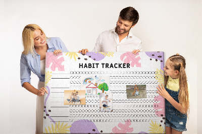 Tablero de corcho decorado con diseño tropical de hojas y puntos