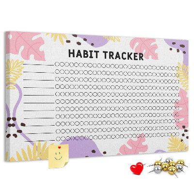 Tablero de corcho decorado con diseño tropical de hojas y puntos