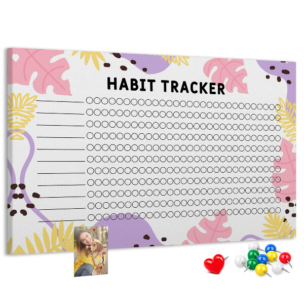 Tablero de corcho decorado con diseño tropical de hojas y puntos