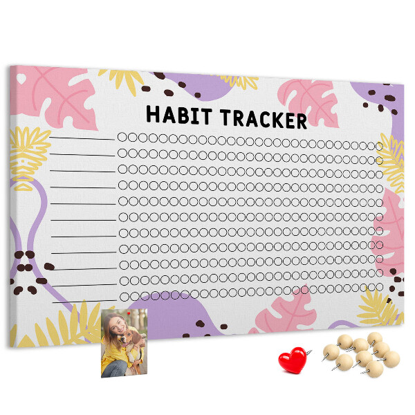 Tablero de corcho decorado con diseño tropical de hojas y puntos