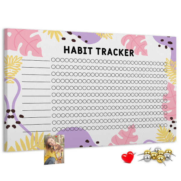 Tablero de corcho decorado con diseño tropical de hojas y puntos