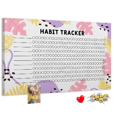 Tablero de corcho decorado con diseño tropical de hojas y puntos
