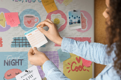 Pizarra de corcho con motivos coloridos y lemas positivos