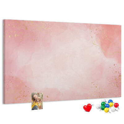 Pizarra de corcho con fondo rosa y delicados detalles dorados