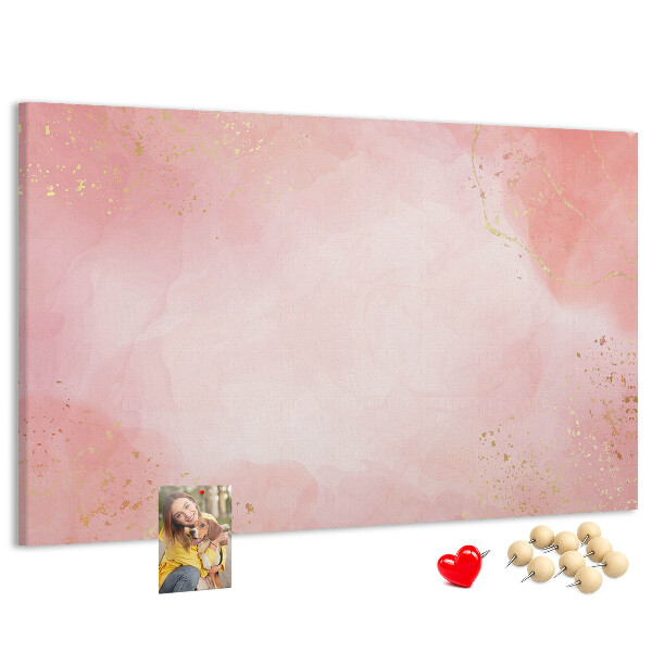 Pizarra de corcho con fondo rosa y delicados detalles dorados