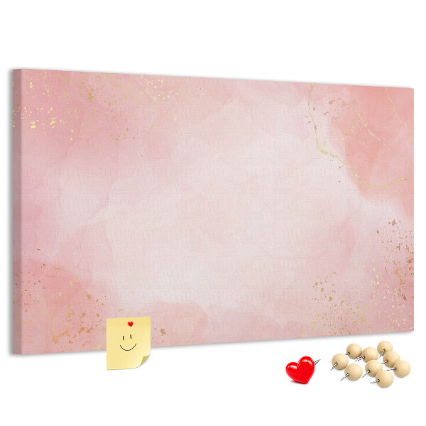 Pizarra de corcho con fondo rosa y delicados detalles dorados