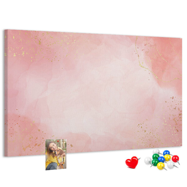 Pizarra de corcho con fondo rosa y delicados detalles dorados