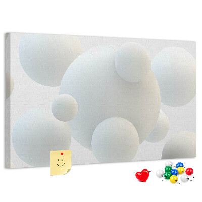 Tablero de anuncios Bolas blancas sobre un fondo claro