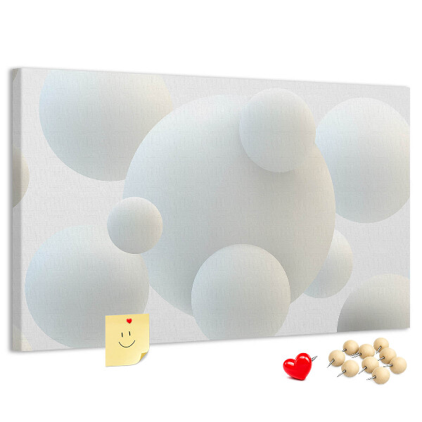 Tablero de anuncios bolas blancas sobre fondo claro