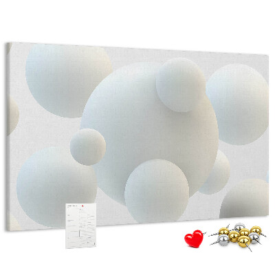 Tablero de anuncios bolas blancas sobre fondo claro