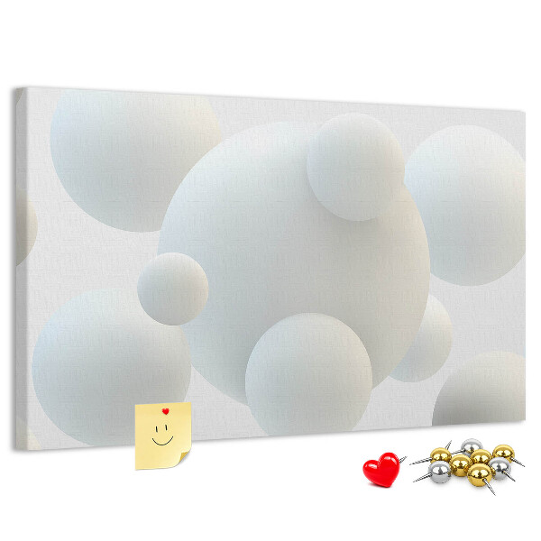 Tablero de anuncios bolas blancas sobre fondo claro
