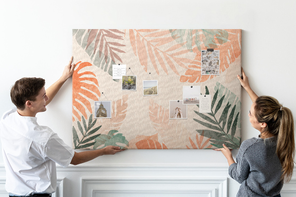 Tablero de anuncios con diseño de hojas tropicales en tonos pastel