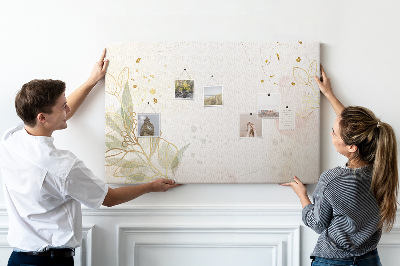 Tablero de corcho decorado con diseño de delicadas flores sobre fondo pastel
