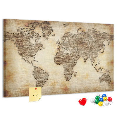 Tablero de anuncios Un antiguo mapa del mundo sobre un fondo de lienzo.