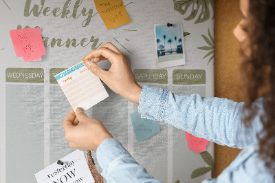 Pizarra de corcho con diseño de agenda semanal y estampado de plantas
