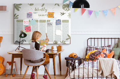 Pizarra de corcho con diseño de agenda semanal y estampado de plantas