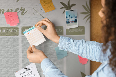 Pizarra de corcho con diseño de agenda semanal y estampado de plantas