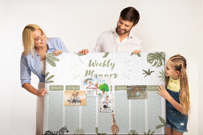 Pizarra de corcho con diseño de agenda semanal y estampado de plantas