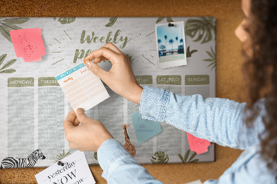 Pizarra de corcho con diseño de agenda semanal y estampado de plantas