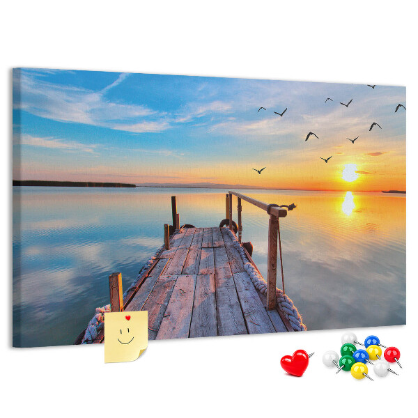 Tablero de anuncios Puesta de sol sobre un lago tranquilo