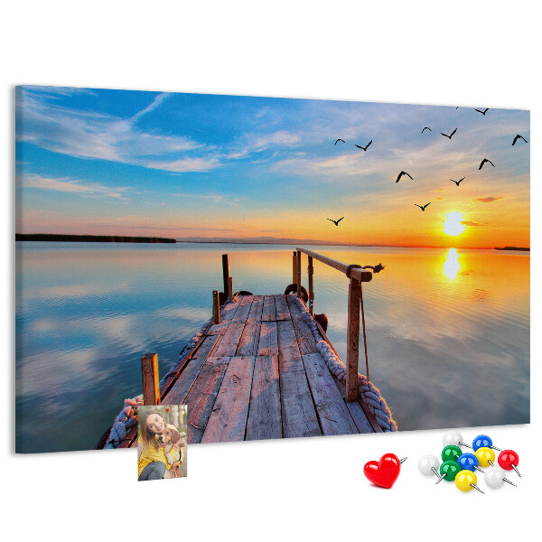 Tablero de anuncios Puesta de sol sobre un lago tranquilo