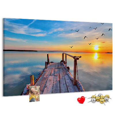 Tablero de anuncios Puesta de sol sobre un lago tranquilo