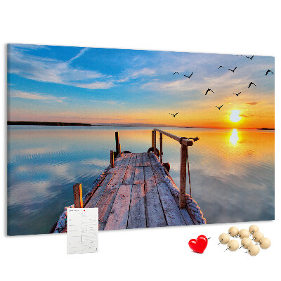 Tablero de anuncios Puesta de sol sobre un lago tranquilo