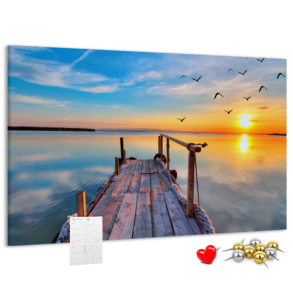 Tablero de anuncios Puesta de sol sobre un lago tranquilo