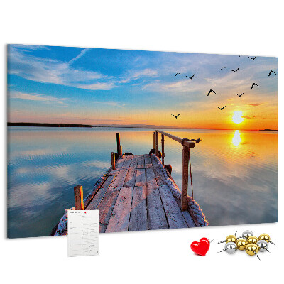 Tablero de anuncios Puesta de sol sobre un lago tranquilo