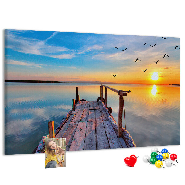 Tablero de anuncios Puesta de sol sobre un lago tranquilo