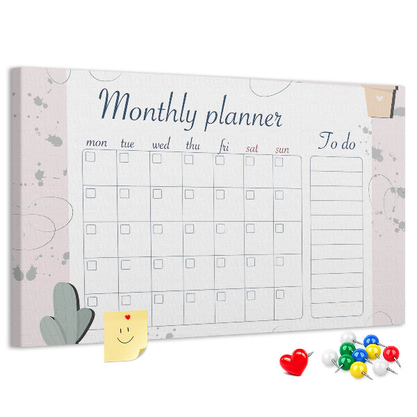 Pizarra de corcho con diseño de agenda mensual y motivos de plantas
