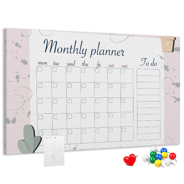 Pizarra de corcho con diseño de agenda mensual y motivos de plantas