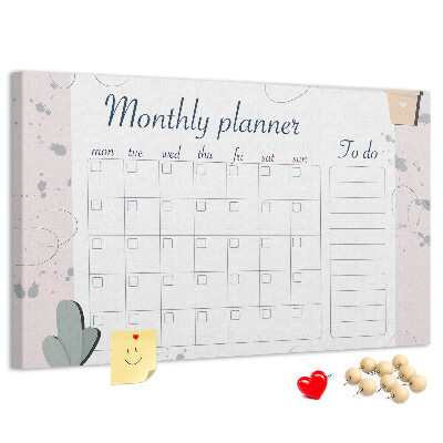 Pizarra de corcho con diseño de agenda mensual y motivos de plantas