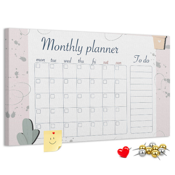Pizarra de corcho con diseño de agenda mensual y motivos de plantas