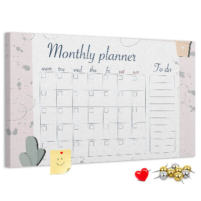 Pizarra de corcho con diseño de agenda mensual y motivos de plantas