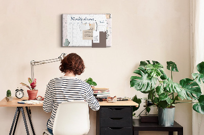 Pizarra de corcho con diseño de agenda mensual y motivos de plantas