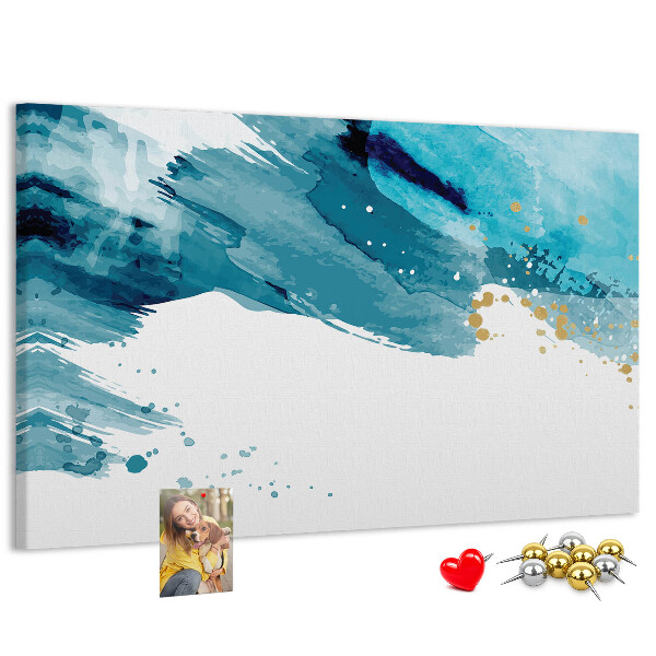 Pizarra de corcho con diseño de olas azules y detalles dorados