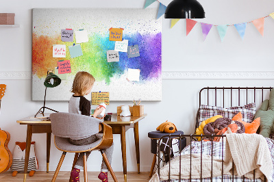 Tablero de corcho decorado con diseño de destellos coloridos en arcoíris